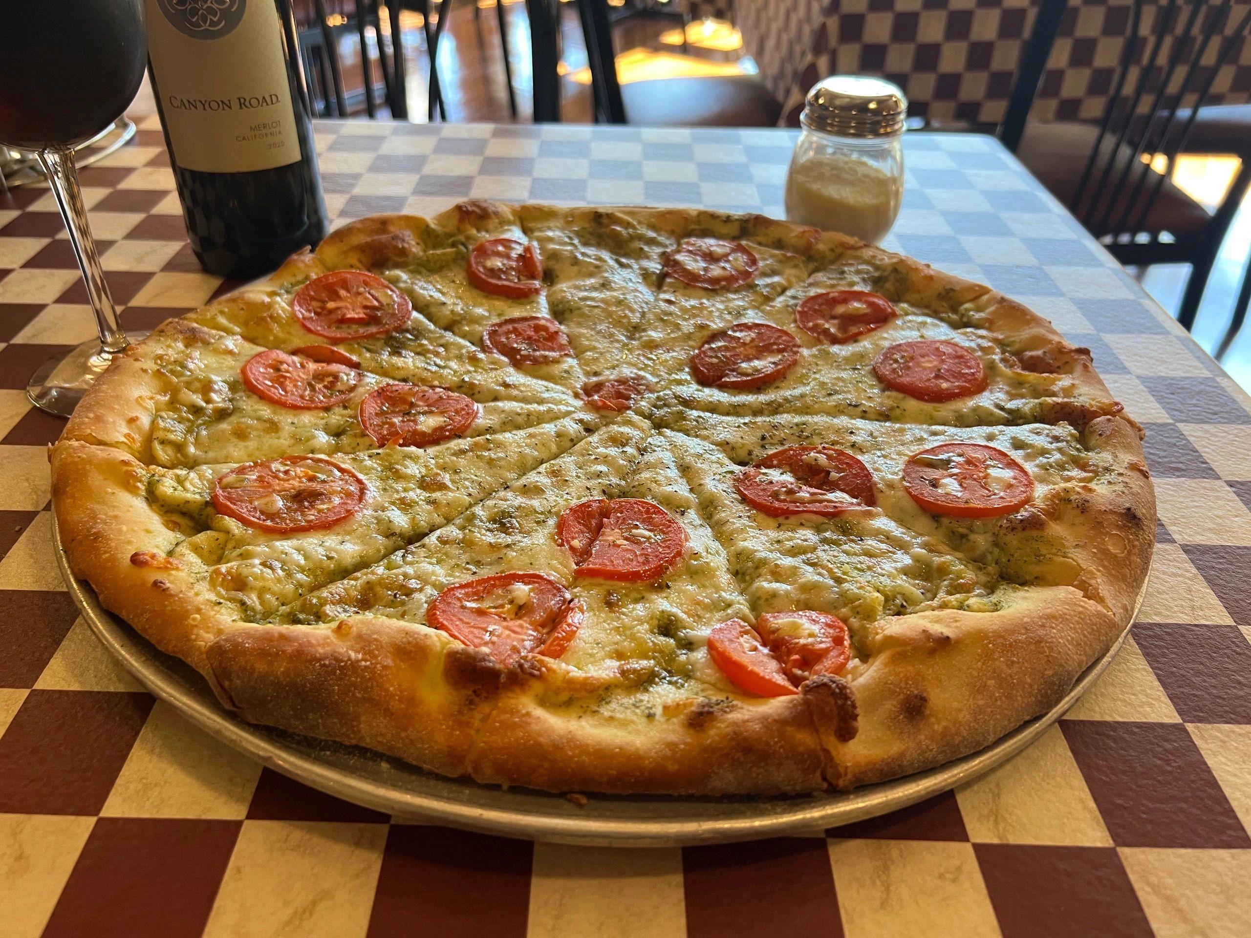 Pizza with Canyon Road wine at Village Pizza