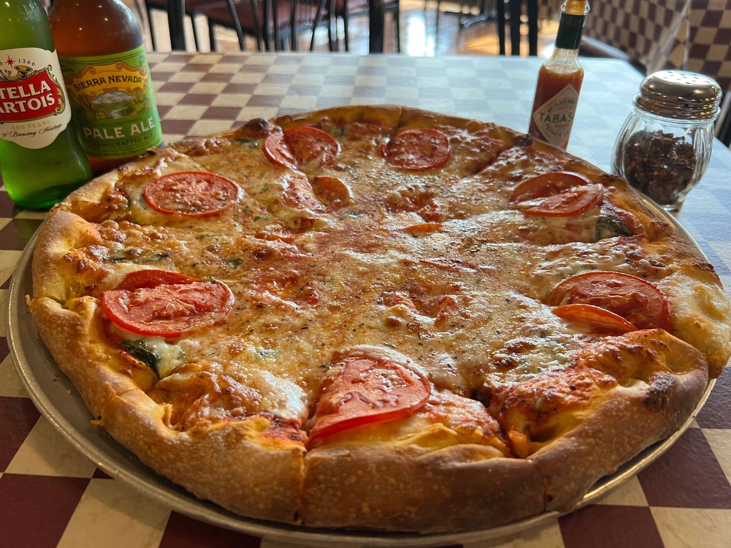Pepperoni pizza with craft beers
