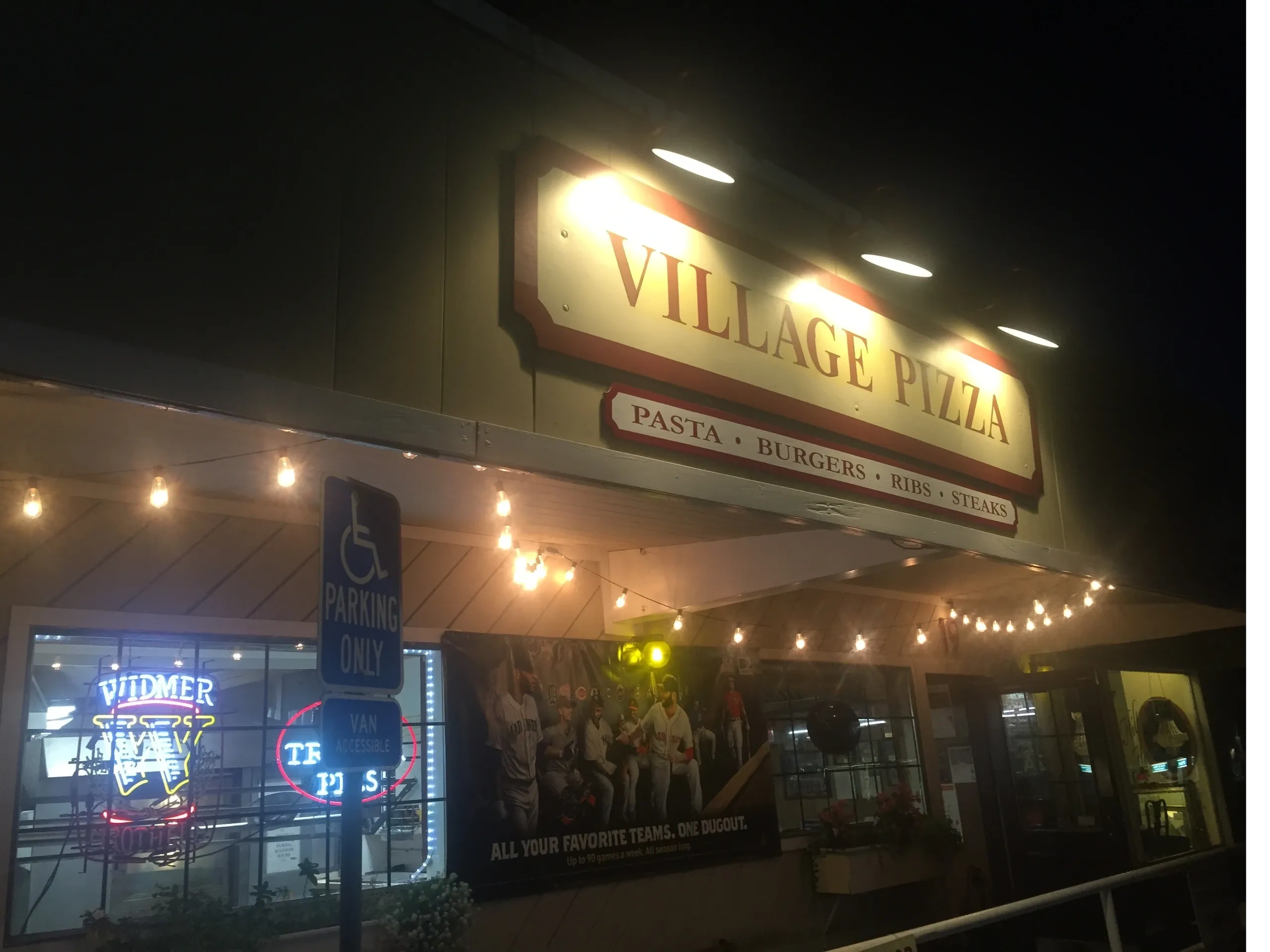 Village Pizza Restaurant storefront — Pasta, Burgers, Ribs, Steaks